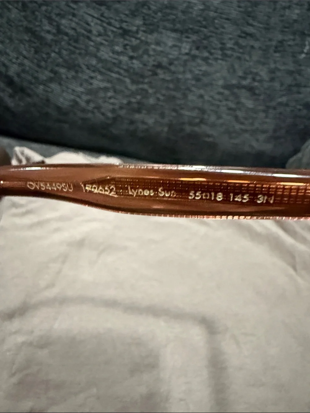 Oliver Peoples Brown Transparent Frame Sunglasses with Brown Lenses.